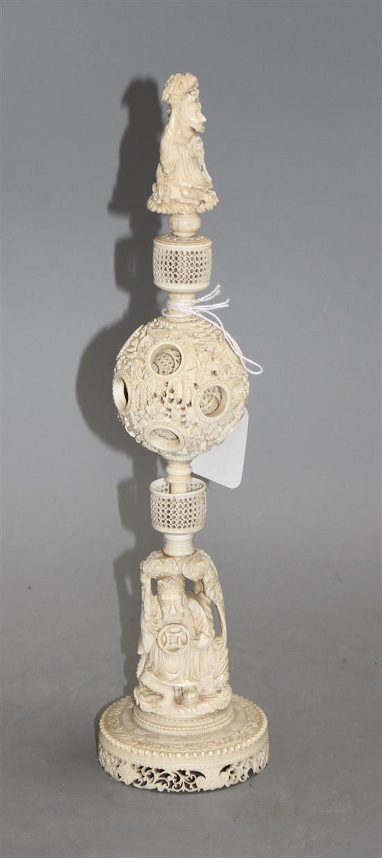A 19th century Chinese carved ivory concentric ball on stand, height 35cm